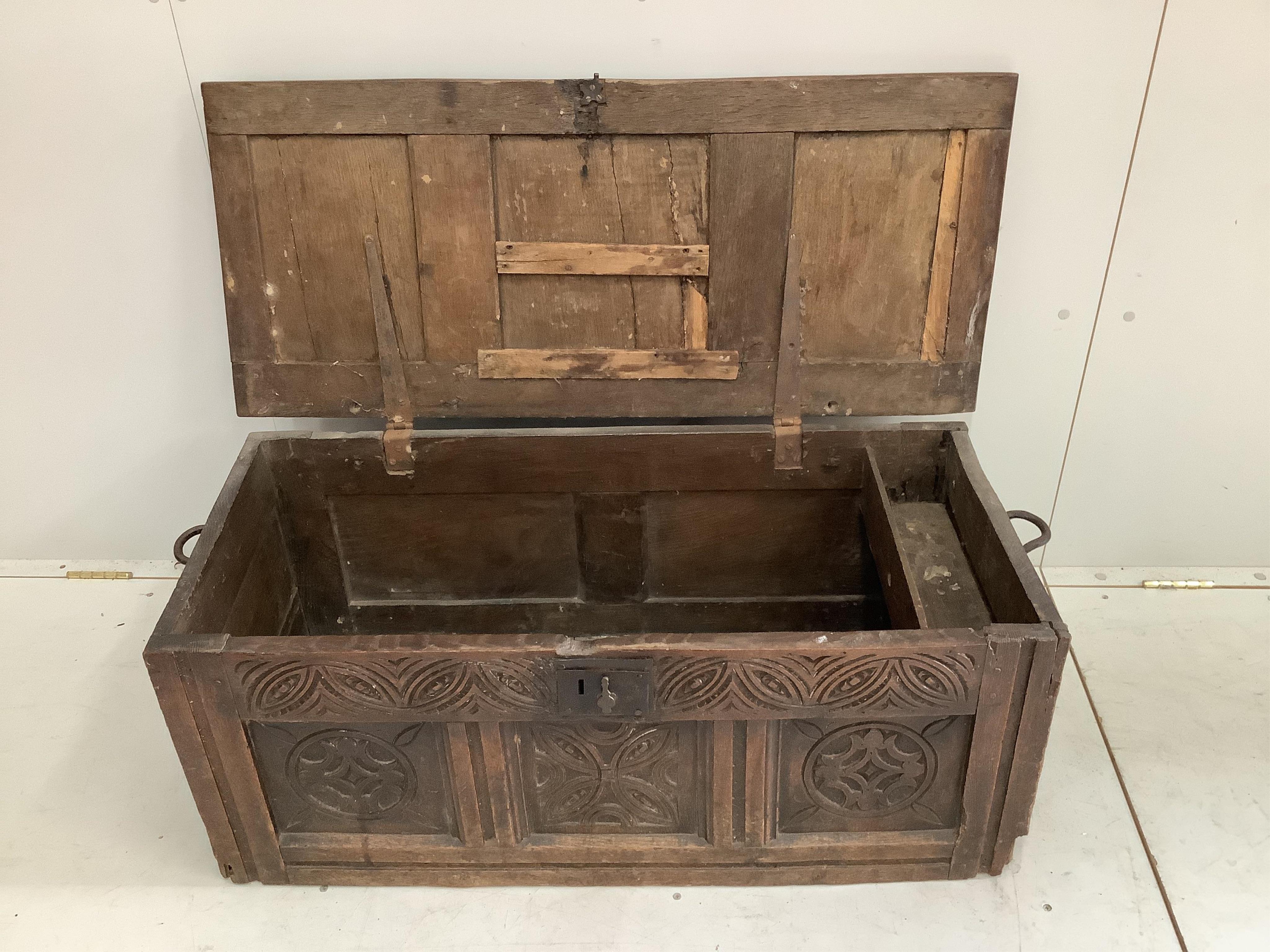 A small 18th century oak coffer, width 100cm, depth 44cm, height 41cm. Condition - poor